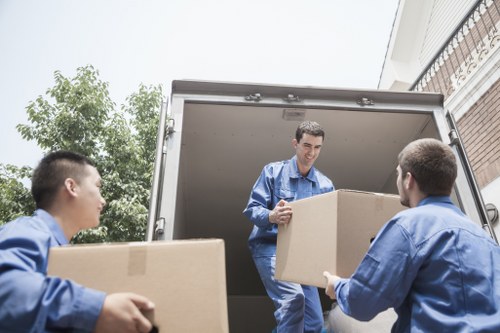 Removal team helping with a house move in Isleworth