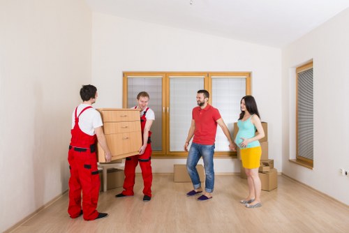 Packed office equipment prepared for relocation in Isleworth