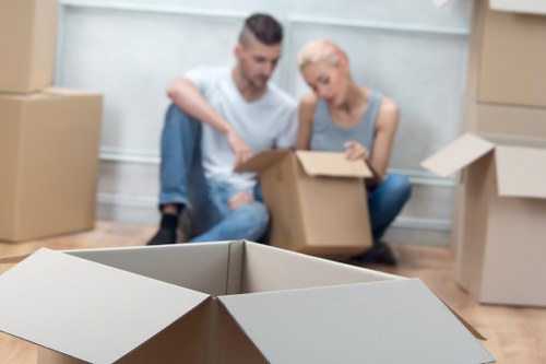 IT equipment and office boxes prepared for a commercial move in Isleworth