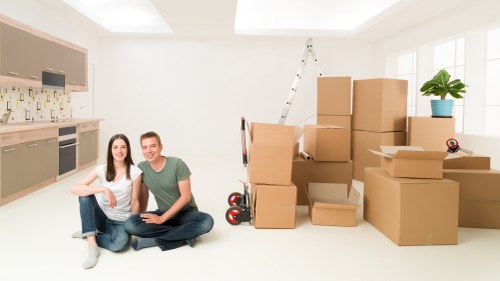 Loading furniture into a moving van for an Isleworth customer