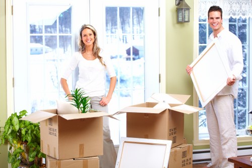 Local removal van loading furniture for a move in Isleworth