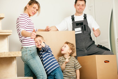Careful packing of household items for an Isleworth relocation
